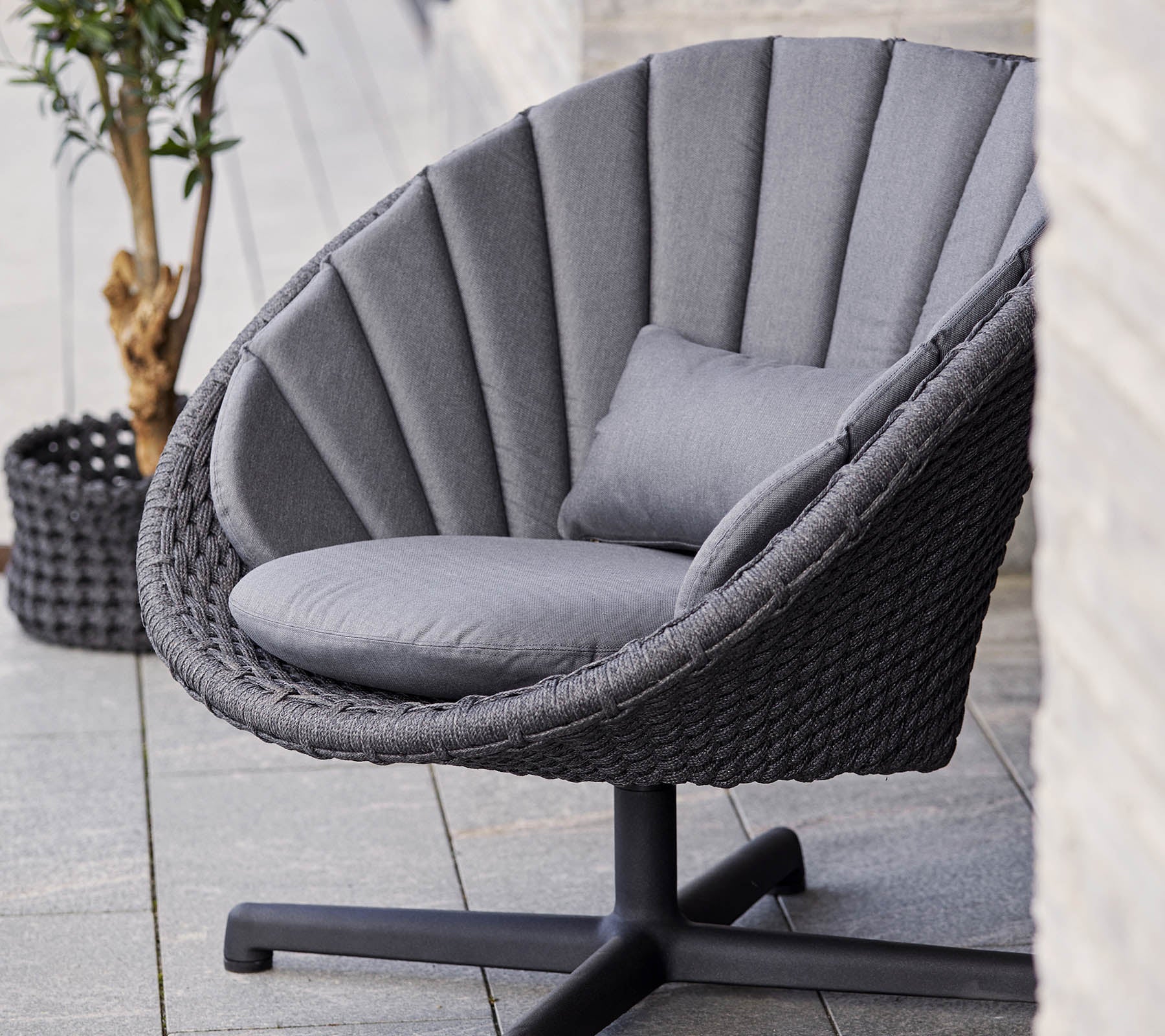 Peacock Outdoor Swivel Lounge Chair Lifestyle
