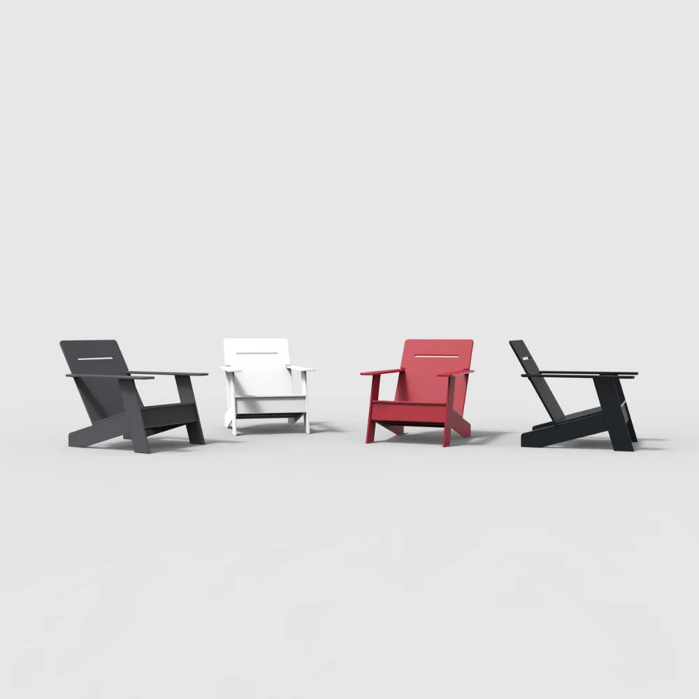 Four modern outdoor lounge chairs in gray, white, red, and black colors