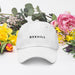 Boxhill's Minimalist Hat with white and flower background