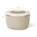 Light brown round hidden propane tank fire pit with lava rocks on fire on top and showing the length size of the product