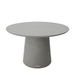 A round concrete outdoor dining table featuring a sturdy circular base, ideal for al fresco gatherings and meals.